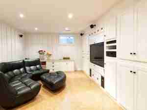 jdm-maryland-basement-remodeling-family-entertaining-white-builtin-cabinets