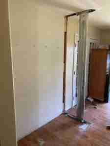 Foyer Entranceway - framing in preparation to add a new bench seat