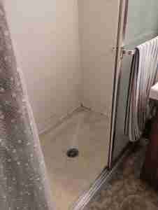 Bathroom Remodeling Project - before image old shower stall